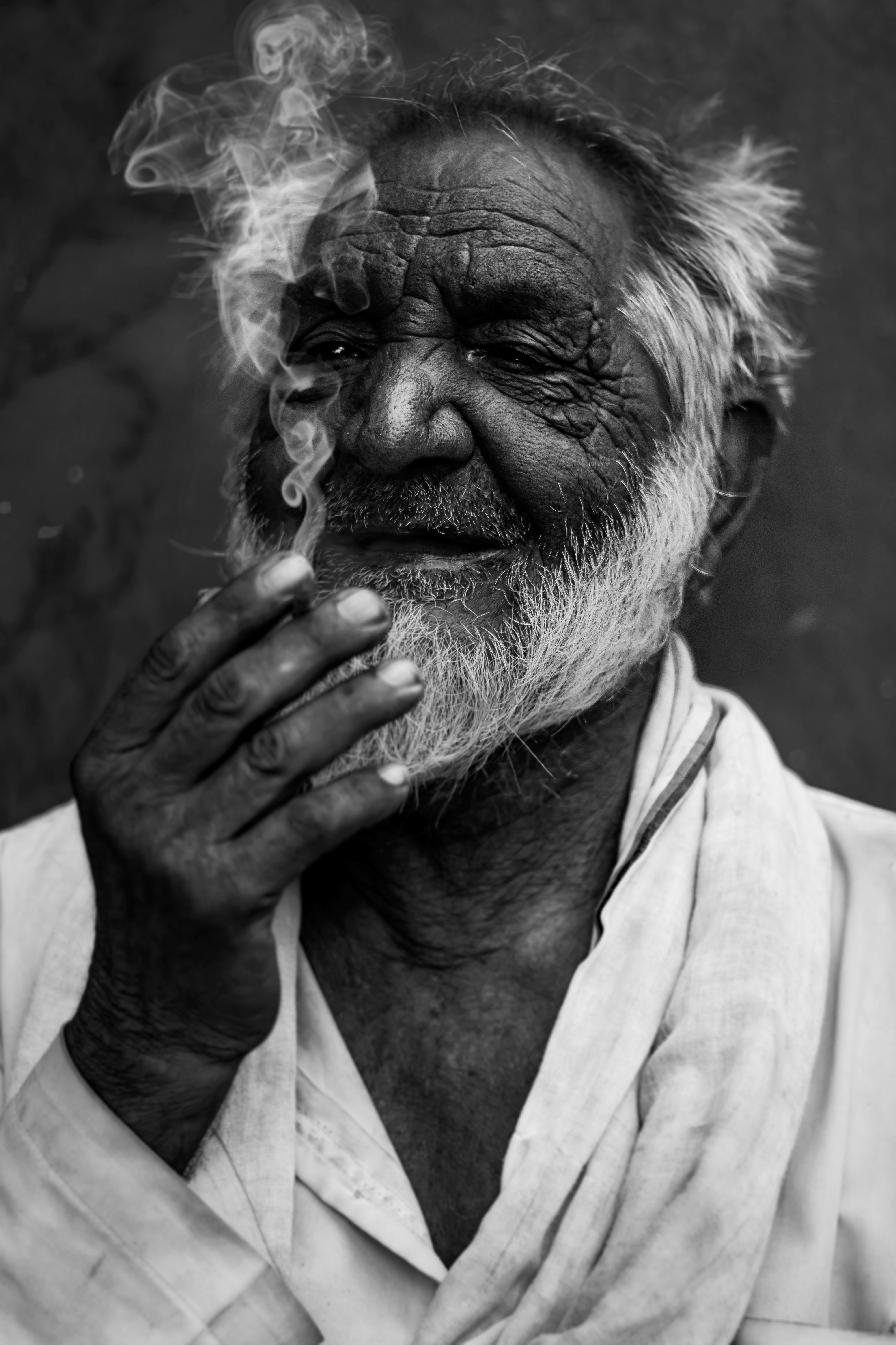 grayscale photo of man in white collared shirt